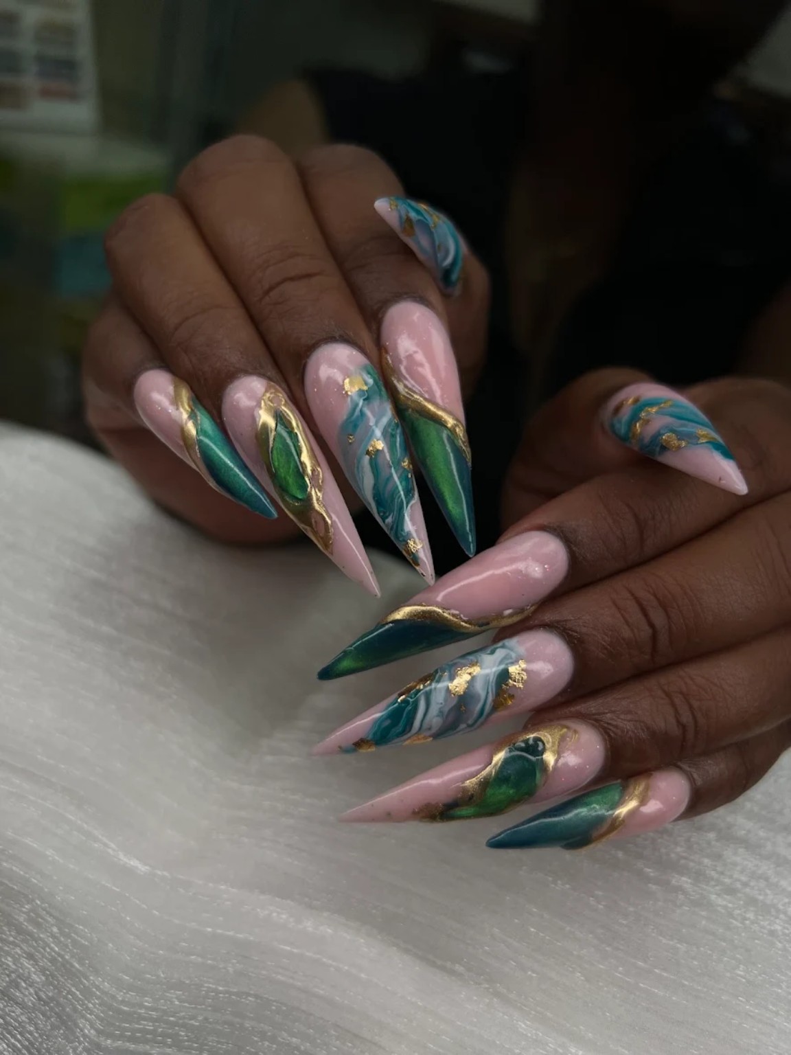 Orange butterfly and 3D floral nails